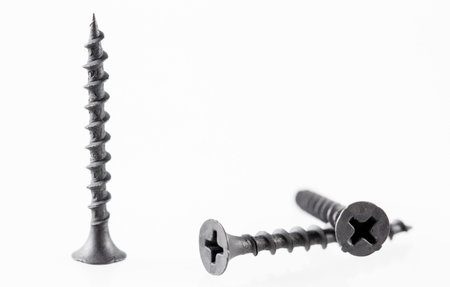 Screws still life large self tapping screws on white backgroundの写真素材