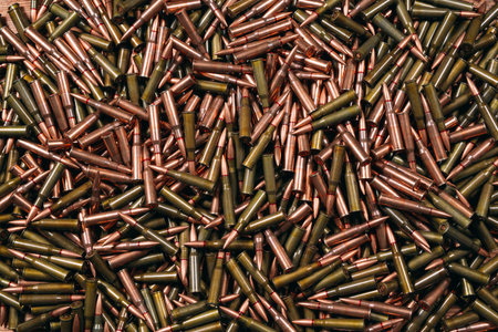 Different ammo on wooden background, weapon concept.