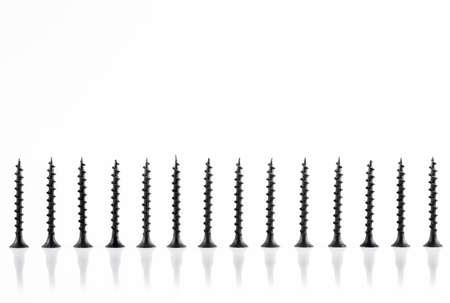 Screws still life large self tapping screws on white backgroundの写真素材