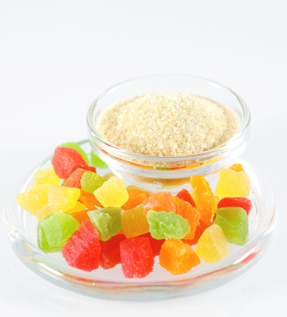 Gelatin and colorful jelly isolated on whiteの写真素材