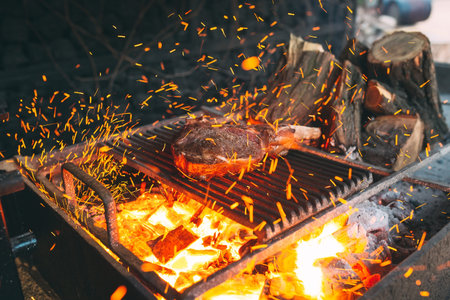 Beef steak is cooked on fire. Beef Rib BBQ .