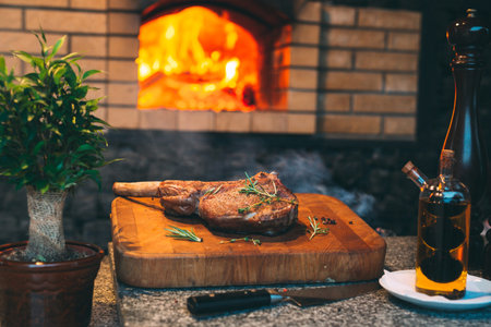 Close up cooking Steak in a stone oven.