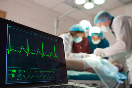 Monitoring of ECG and saturation O2 in the patient in the operating room.