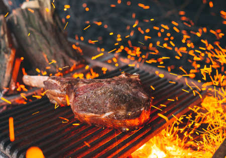 Beef steak is cooked on fire. Beef Rib BBQ .の写真素材