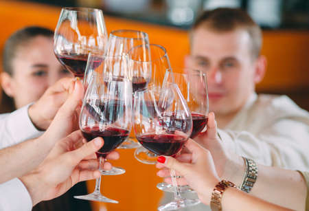 Close-up Of Friends Toasting Wineglasses At Partyの写真素材