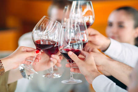 Close-up Of Friends Toasting Wineglasses At Partyの写真素材