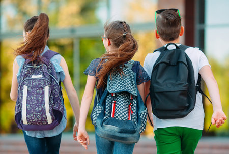 Group of kids going to school together.