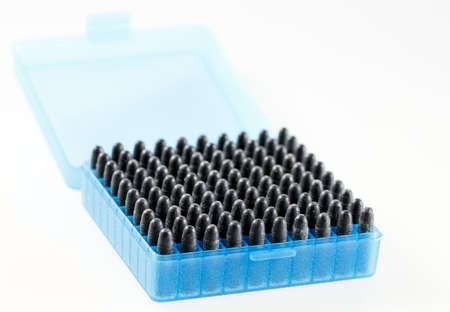 Hunting cartridges in a plastic box. Bullet storage box.の写真素材