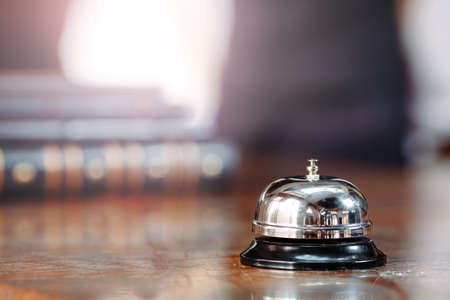 Hotel service bell Concept hotel, travel, room,Modern luxury hotel reception counter desk on background.の素材 [FY310159639917]