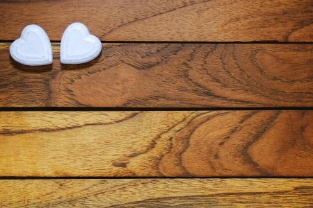 Two white hearts with wooden の写真素材