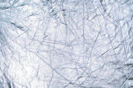 texture of a silver reflector for photography, abstract background