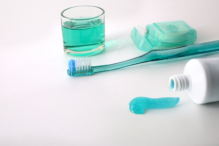 Equipment for oral hygiene on a white table. Horizontal composition. Elevated view.の写真素材