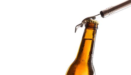 Beer bottle neck closed with bottle opener on top with white background.  Horizontal composition. Front view.の写真素材