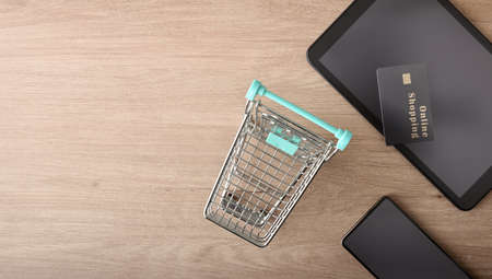 Online payment concept with tablet mobile cart and cardの写真素材