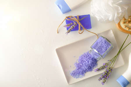 Background with shower products with lavender extract with elements for personal hygiene on white table. Top view. Landscape composition.の写真素材
