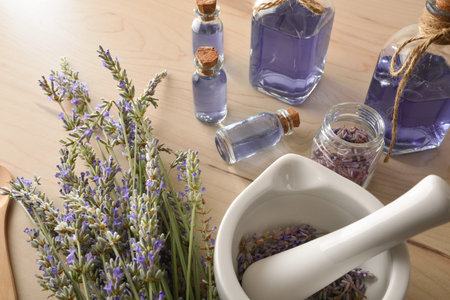 Homemade preparation of natural lavender essence with elements for the preparation and containers...