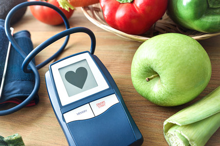 Conceptual background of healthy eating and satisfactory blood pressure with blood pressure monitor...