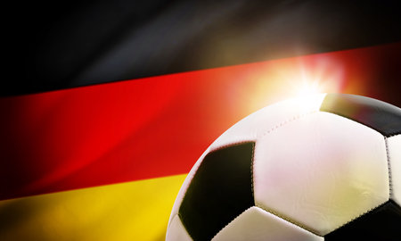 Germany soccer background with ball and the country's flag in the background.の写真素材