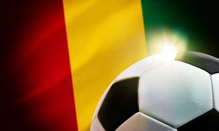 Guinea soccer background with ball and the country's flag in the background.の写真素材