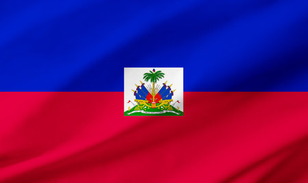 Background detail of Haiti flag occupying the entire frame with waving fabric texture.の写真素材
