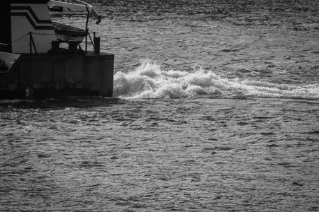 waves after a ship in the river of the Danube