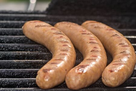 grilled sausages on grillの写真素材