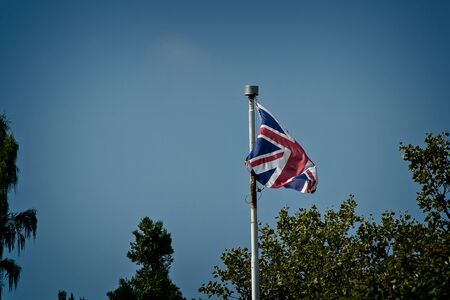 Flags on a poleの写真素材