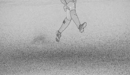 A black and white sketch of a soccer playerの写真素材
