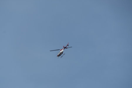 Helicopter in the blue sky.の写真素材