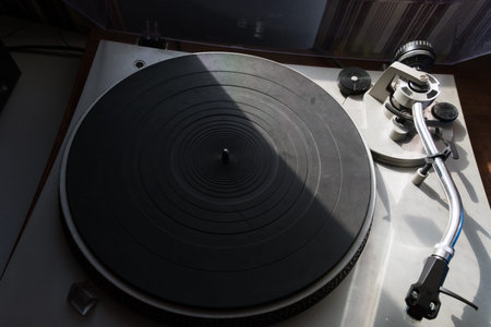 Turntable with a vinyl record, close-up. Music concept