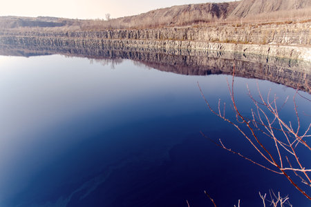 Abandoned quarry lake in winter. Russia, Siberia, Altai mountains