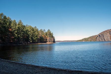 Landscape with lake, forest and blue sky. Beautiful nature scenery.の写真素材