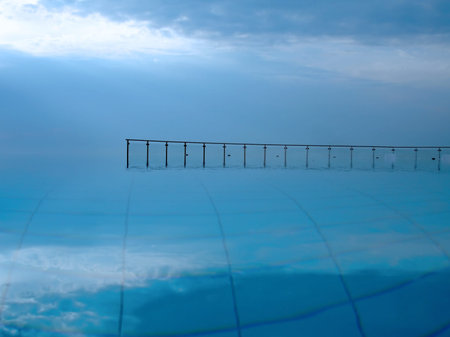 Empty pool and sky before rain. の写真素材