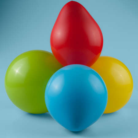 Balloons in composizone with blue backgroundの写真素材