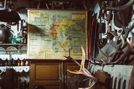 Antique shop with world map, deer antlers and other antique objects