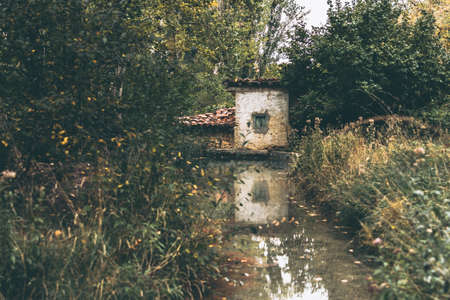 Old mill at the edge of a river. Spainの写真素材