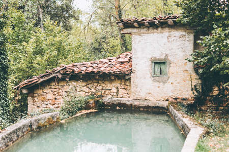 Old mill at the edge of a river. Spainの写真素材