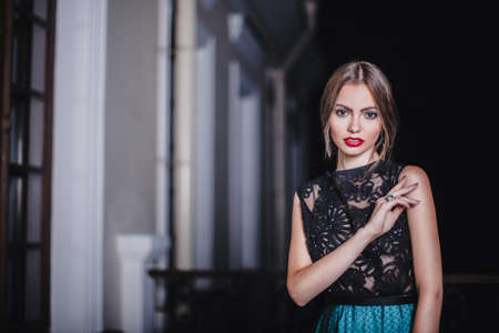 Beautiful girl in evening dress with long hairの写真素材
