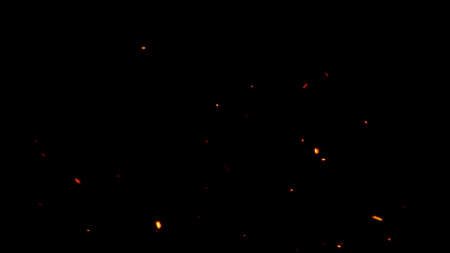 Flying glowing fire sparks with a black backgroundの写真素材