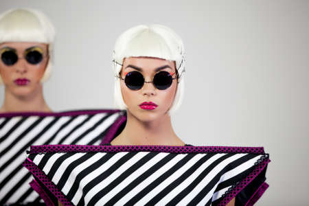 Dancing fashion girls on white background 5kの写真素材