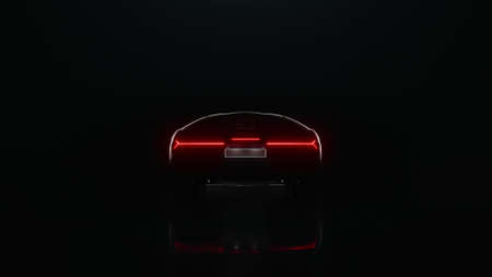 3d render sports car drives off into the distance on a black backgroundの写真素材