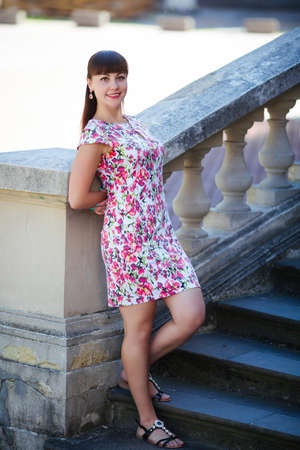 beautiful girl posing on city background.のeditorial素材
