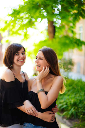 two beauties posing against the background of the city.のeditorial素材