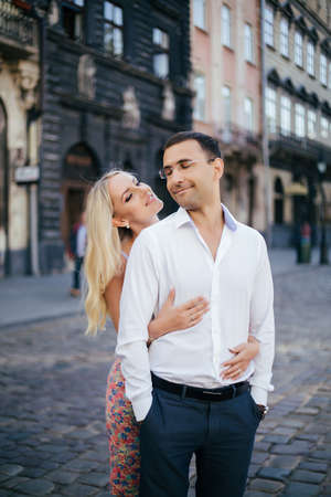 Romantic tourist couple walking around the city relaxingの写真素材