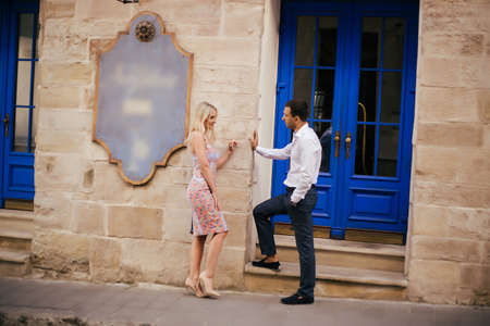 Romantic tourist couple walking around the city relaxing.の写真素材