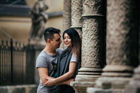 young couple posing on city background, travel conceptの写真素材