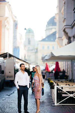 Beautiful couple in love dating outdoors and smilingの写真素材