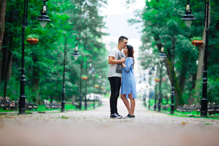 Couple in a forest, warm summer, lovely weatherの写真素材