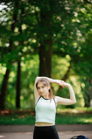 young sexy girl goes in for sports in nature