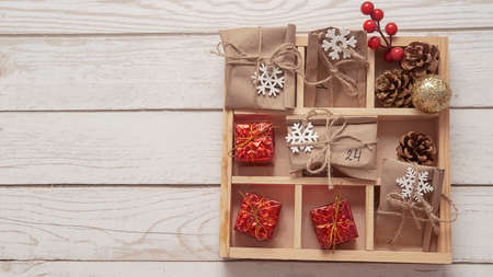 Christmas advent calendar 2022 with your own hands from ecological recycled materials , the concept of Christmas and reasonable conscious consumption , a place for textの写真素材